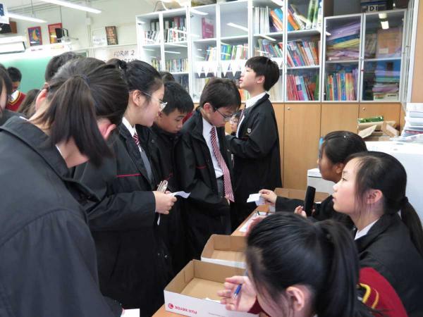 Students and teachers interacting with each other in English Café