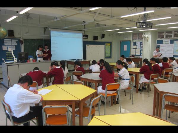 Students pray at class prayer meeting